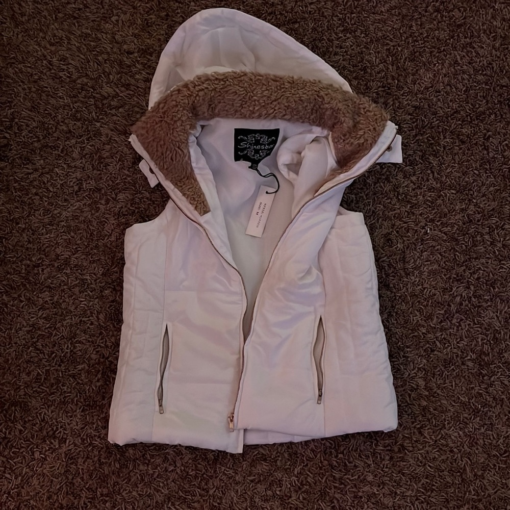 white vest